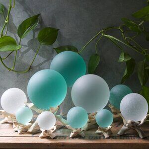 1 glass seafoam seaglass sphere with driftwood stand  3" diameter